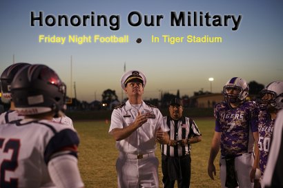 It was also Military Night at Lemoore's football game. Captain Markus J. Gudmundsson, Cmdr. Strike Fighter Wing, U.S. Pacific Fleet, provides the coin toss before the game.